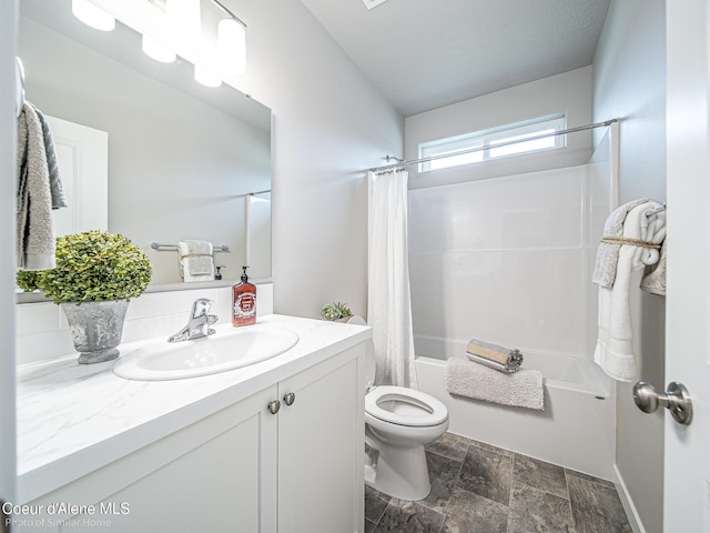 13748 N Apex Way, Hayden, ID 83835 - bathroom with stone finish flooring, shower / bath combo with shower curtain, toilet, and vanity