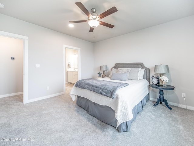 13748 N Apex Way, Hayden, ID 83835 - bedroom featuring a ceiling fan, ensuite bath, light carpet, and baseboards