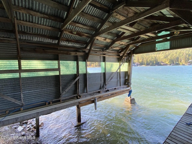 dock area with a water view