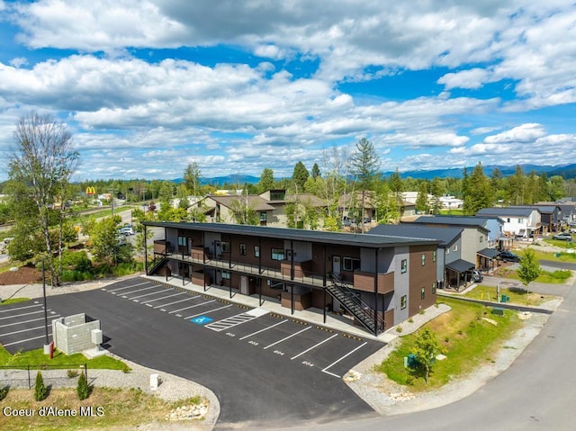 50 Carnelian Ave Unit 203, Ponderay, ID 83852 - exterior space with a residential view, a mountain view, and stairway