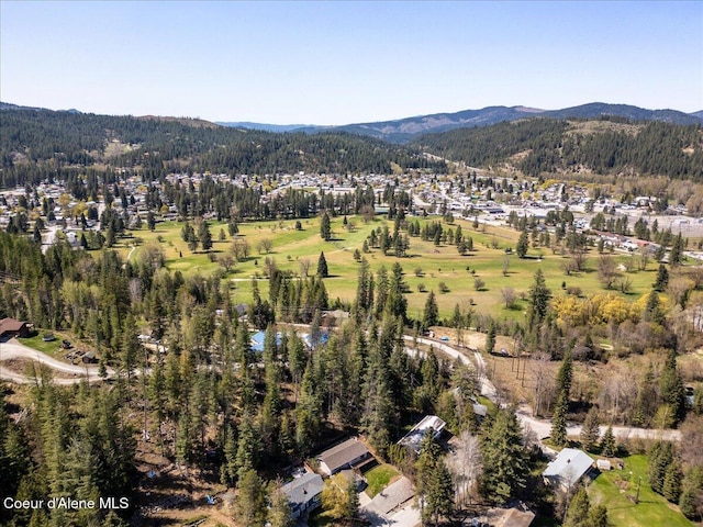 bird's eye view with a residential view, a mountain view, and a forest view