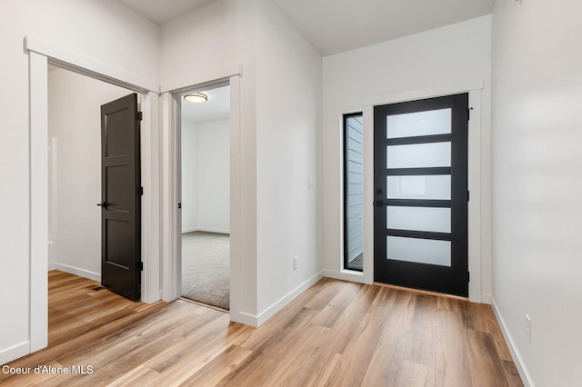 NNN Rocky Rd, Rathdrum, ID 83858 - foyer entrance with baseboards, visible vents, and light wood finished floors