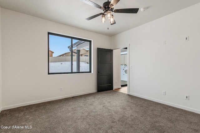 NNN Rocky Rd, Rathdrum, ID 83858 - spare room with carpet flooring, baseboards, and a ceiling fan