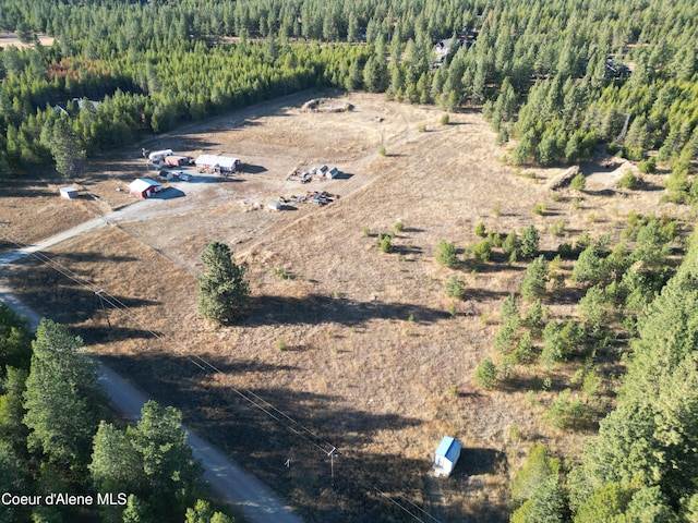 NNN Rocky Rd, Rathdrum, ID 83858 - drone / aerial view with a wooded view