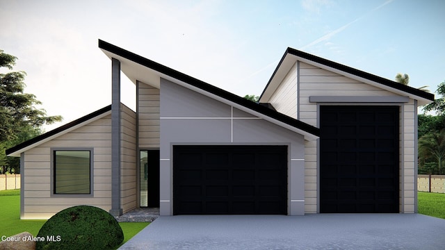 NNN Rocky Rd, Rathdrum, ID 83858 - view of front of home with concrete driveway and a garage