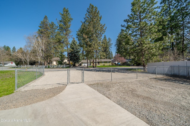 view of yard featuring a gate and fence