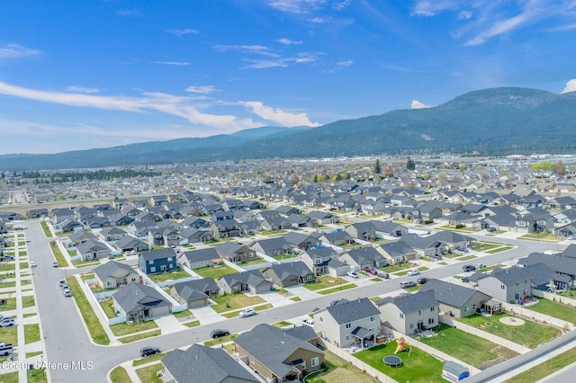 aerial view featuring a mountain view and a residential view