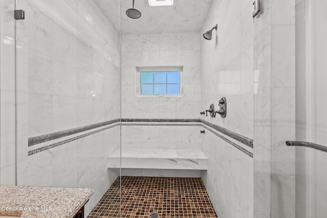 full bathroom with a shower stall