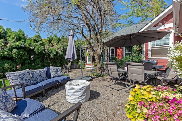 view of patio with an outdoor living space and outdoor dining space