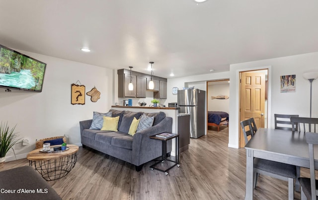 720 N 3rd Ave Unit 12, Sandpoint, ID 83864 - living area with light wood-style flooring, recessed lighting, and baseboards