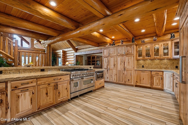 kitchen with recessed lighting, light wood-style flooring, wooden ceiling, and range with two ovens