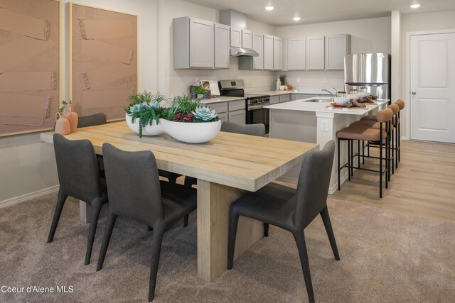 120 E Spirea Ln, Hayden, ID 83835 - dining space featuring recessed lighting, baseboards, and light colored carpet