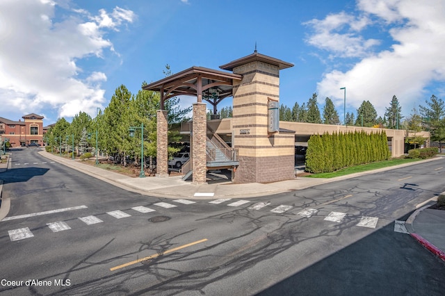 exterior space featuring sidewalks and curbs