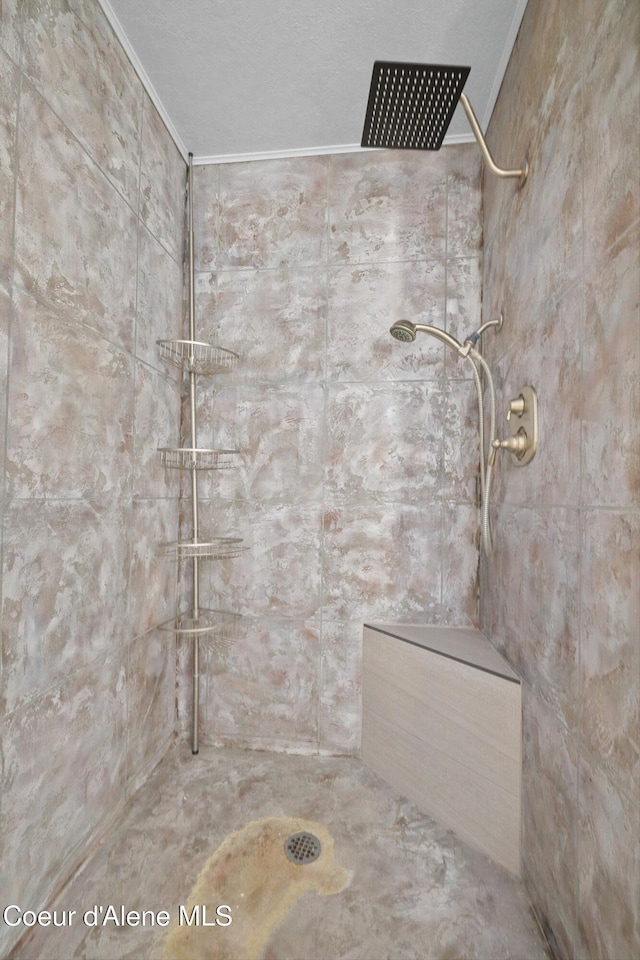 956 N Armstrong Dr, Coeur Dalene, ID 83814 - bathroom with tiled shower and ornamental molding