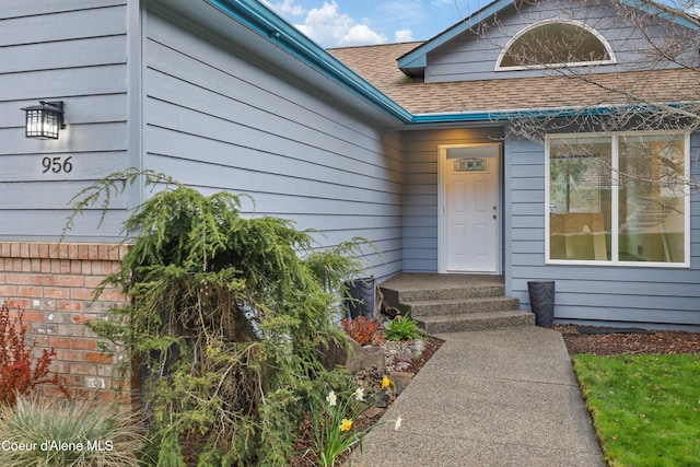 956 N Armstrong Dr, Coeur Dalene, ID 83814 - property entrance featuring a shingled roof