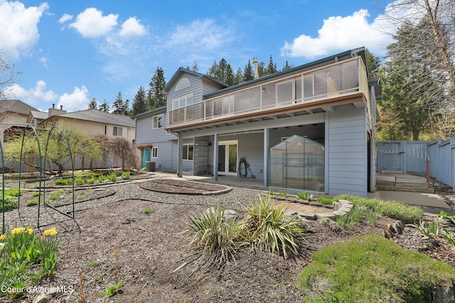 956 N Armstrong Dr, Coeur Dalene, ID 83814 - rear view of house with a gate and a patio area