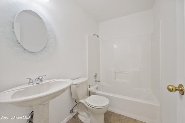 956 N Armstrong Dr, Coeur Dalene, ID 83814 - full bathroom featuring shower / washtub combination, toilet, tile patterned floors, and baseboards