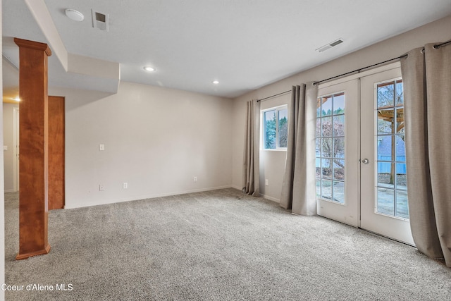 956 N Armstrong Dr, Coeur Dalene, ID 83814 - empty room featuring french doors, plenty of natural light, carpet flooring, recessed lighting, and baseboards