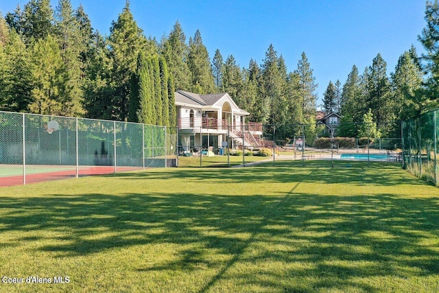 956 N Armstrong Dr, Coeur Dalene, ID 83814 - view of home's community featuring community basketball court and stairway