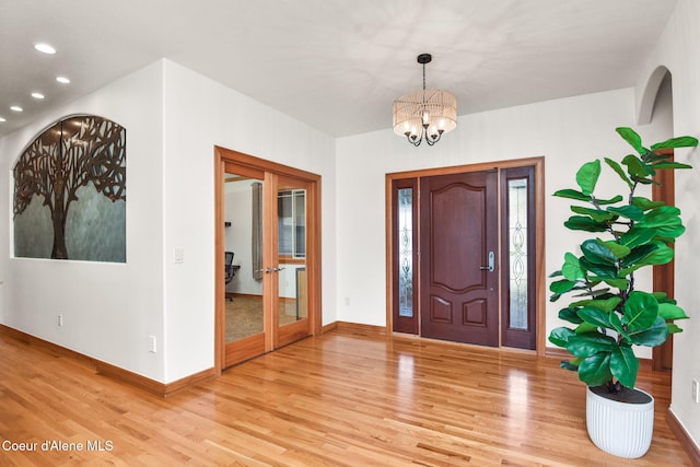 9024 N Baldwin Ct, Hayden, ID 83835 - foyer entrance with recessed lighting, a chandelier, french doors, and wood finished floors