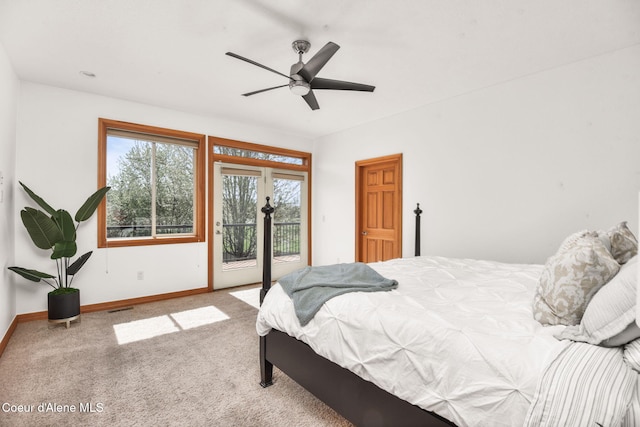 9024 N Baldwin Ct, Hayden, ID 83835 - carpeted bedroom featuring a ceiling fan, baseboards, visible vents, and access to exterior