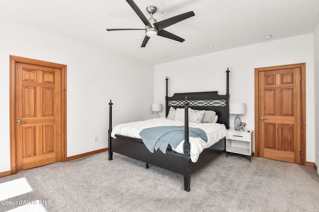 9024 N Baldwin Ct, Hayden, ID 83835 - bedroom with light colored carpet, baseboards, and ceiling fan