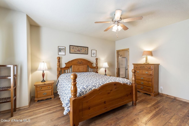 bedroom featuring ceiling fan and wood finished floors
