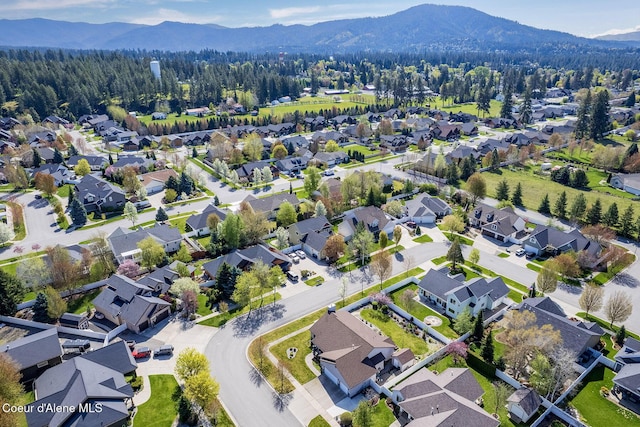 aerial view featuring a residential view and a mountain view