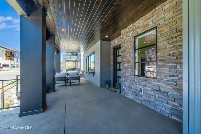 3132 N Atlas Rd, Coeur Dalene, ID 83814 - view of patio / terrace featuring covered porch