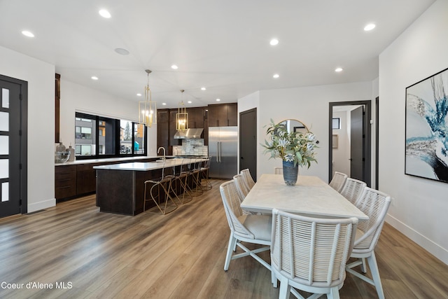 3132 N Atlas Rd, Coeur Dalene, ID 83814 - dining space featuring baseboards, recessed lighting, and light wood-style floors