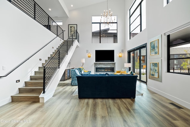 3132 N Atlas Rd, Coeur Dalene, ID 83814 - living area featuring wood finished floors, visible vents, and stairs