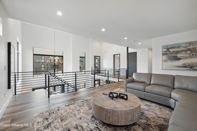 3132 N Atlas Rd, Coeur Dalene, ID 83814 - living area featuring an inviting chandelier, wood finished floors, and recessed lighting