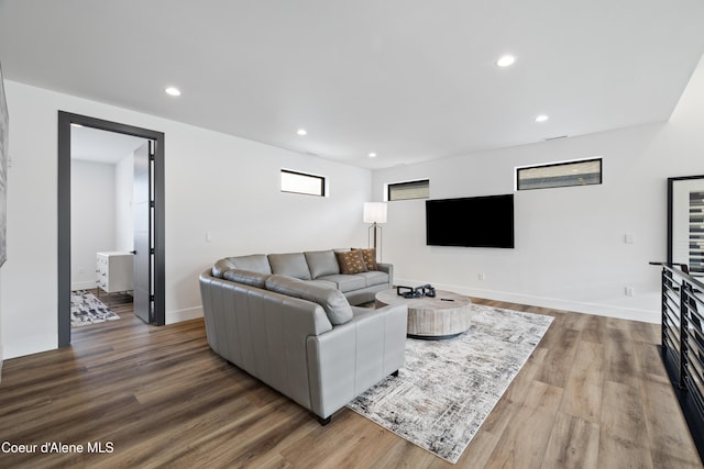 3132 N Atlas Rd, Coeur Dalene, ID 83814 - living area with baseboards, wood finished floors, and recessed lighting
