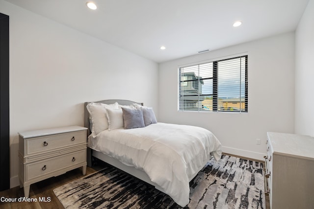 3132 N Atlas Rd, Coeur Dalene, ID 83814 - bedroom featuring recessed lighting, dark wood finished floors, visible vents, and baseboards