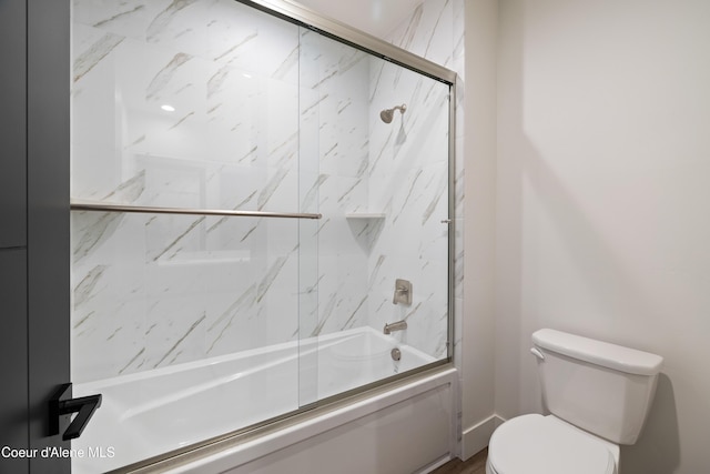 3132 N Atlas Rd, Coeur Dalene, ID 83814 - bathroom featuring bath / shower combo with glass door and toilet