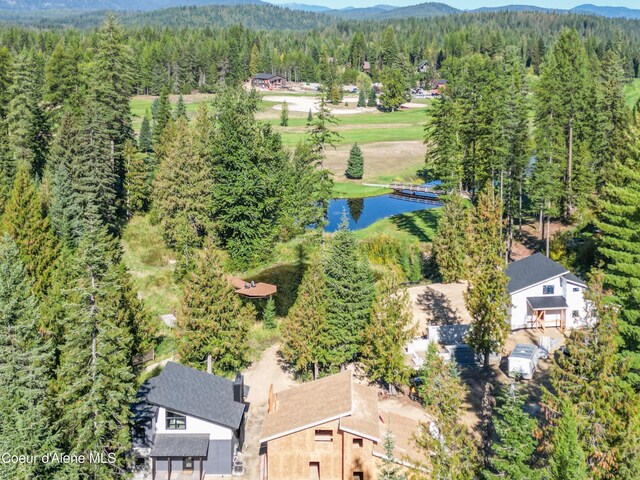 70 Wedge Ct, Priest Lake, ID 83856 - aerial view featuring a view of trees and a water and mountain view
