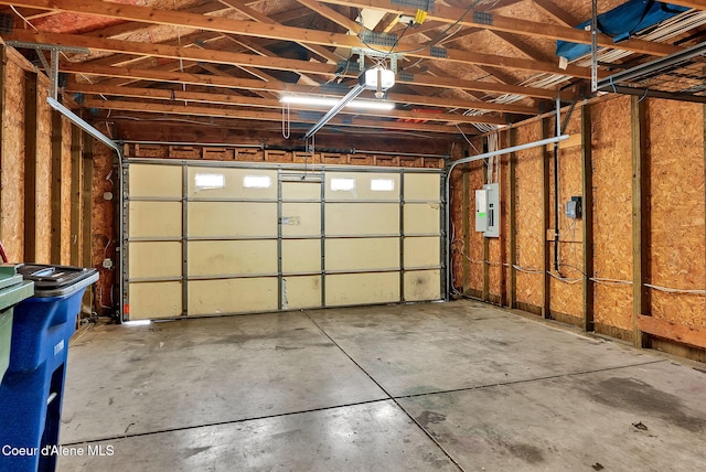 1002 E St Elias Ct, Post Falls, ID 83854 - garage with electric panel and a garage door opener