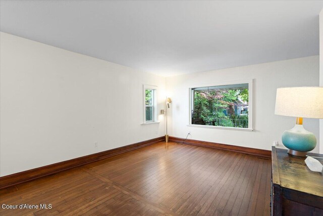 917 E Young Ave, Coeur Dalene, ID 83814 - unfurnished room with hardwood / wood-style flooring and baseboards