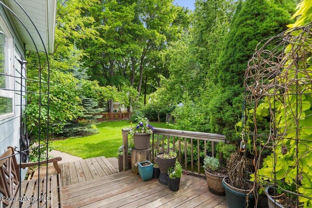 917 E Young Ave, Coeur Dalene, ID 83814 - wooden terrace featuring a yard