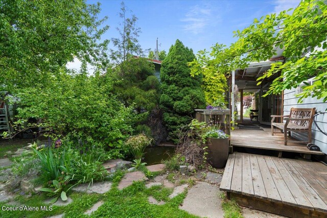 917 E Young Ave, Coeur Dalene, ID 83814 - view of yard featuring a deck