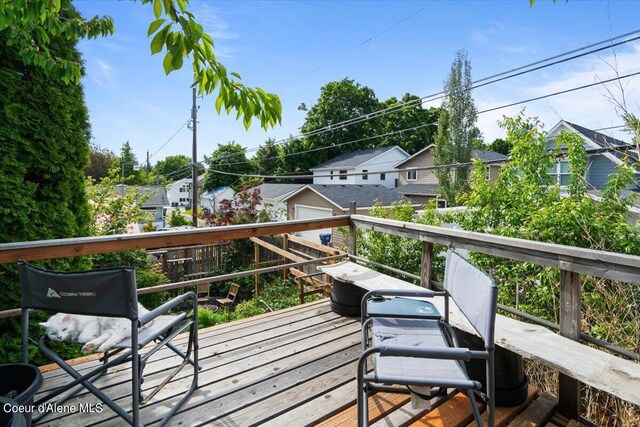 917 E Young Ave, Coeur Dalene, ID 83814 - wooden terrace featuring a residential view