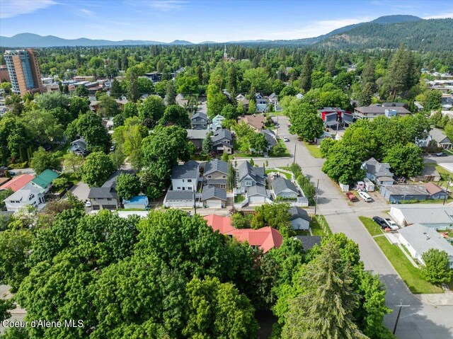 917 E Young Ave, Coeur Dalene, ID 83814 - aerial view of residential area with mountains and a forest