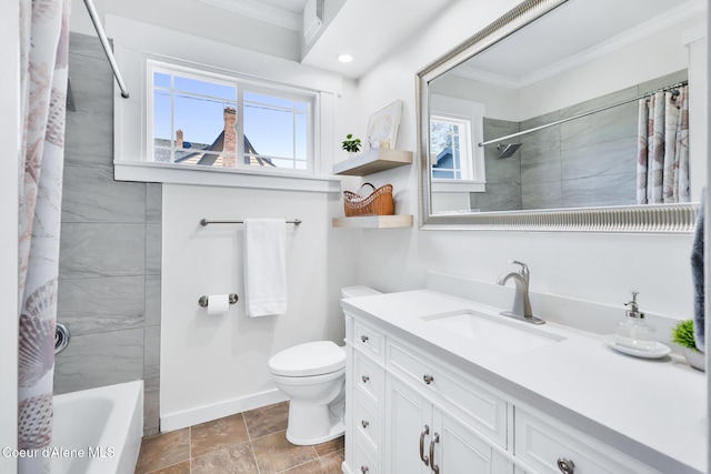full bath with baseboards, crown molding, vanity, and toilet