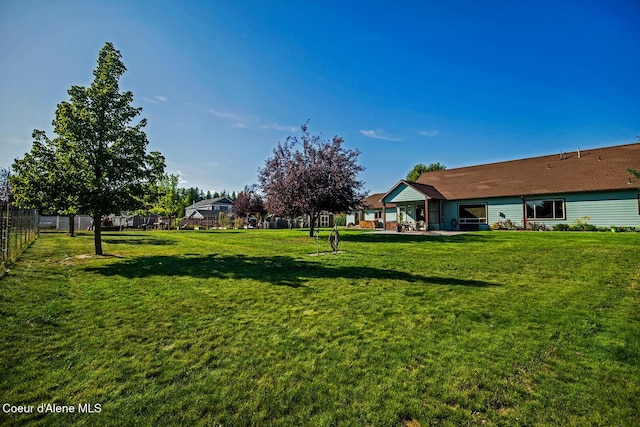 view of yard with fence
