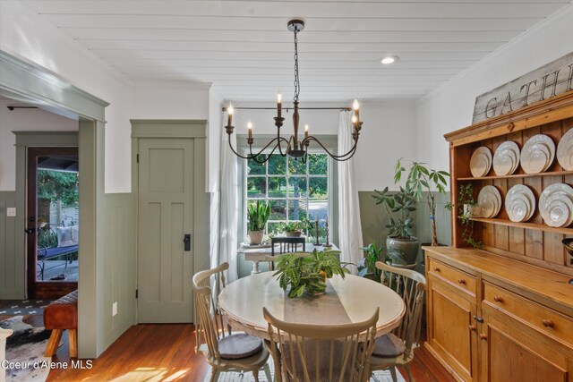 419 N Park Dr, Coeur Dalene, ID 83814 - dining space with a notable chandelier and dark wood finished floors