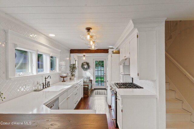 419 N Park Dr, Coeur Dalene, ID 83814 - kitchen featuring stainless steel appliances, a sink, white cabinetry, crown molding, and light countertops