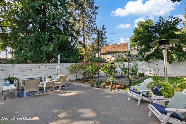 419 N Park Dr, Coeur Dalene, ID 83814 - view of patio featuring a fenced backyard and outdoor lounge area