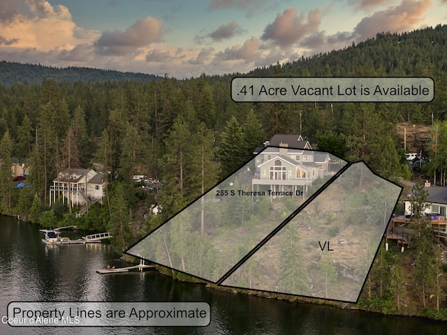 255 S Theresa Terrace Dr, Post Falls, ID 83854 - bird's eye view featuring a water view and a wooded view