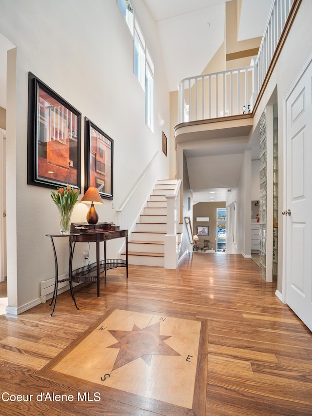 255 S Theresa Terrace Dr, Post Falls, ID 83854 - entrance foyer with stairway, a high ceiling, and wood finished floors