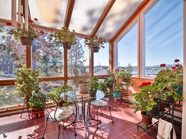 255 S Theresa Terrace Dr, Post Falls, ID 83854 - sunroom / solarium with tile patterned flooring, a water view, and beam ceiling